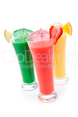 Full glasses of fruit juice with fruit pieces