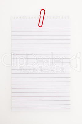 Blank page with red paperclip