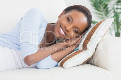 Black woman lying on side