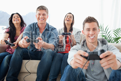 A laughing group enjoying the game together