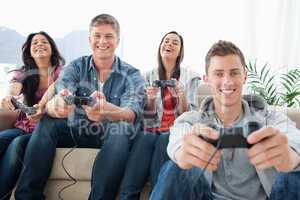 A laughing group enjoying the game together