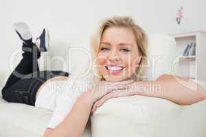 Woman smiling while lying down