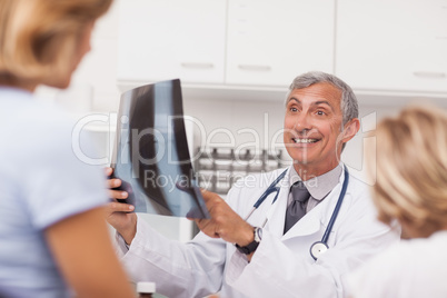 Doctor examining the X-ray of a patient