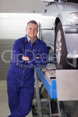 Man standing next to a car