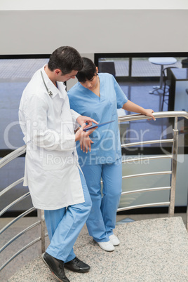 Doctor showing someting to a nurse