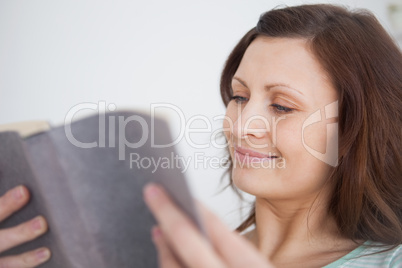 Woman looking at a book