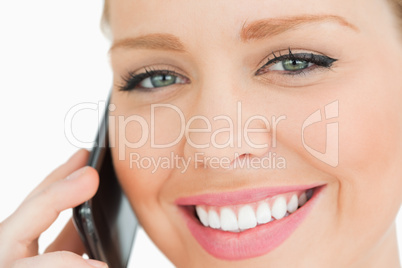 Close up of a woman calling with her smartphone