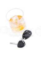 Car key and a whiskey on the rocks