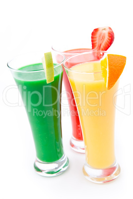 Full glasses with fruits pieces