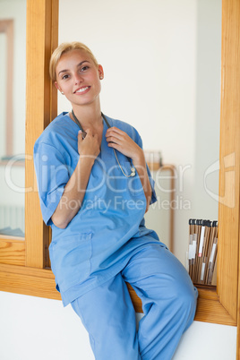 Nurse sitting on the reception desk