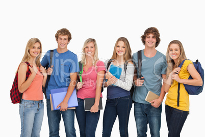 Smiling students all geared up for college