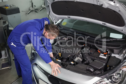 Mechanic repairing an engine