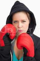 Woman showing her boxing gloves