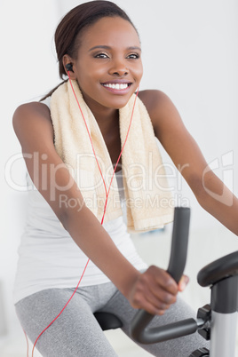 Black woman looking away while doing sport