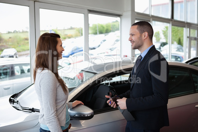 Dealer speaking to a client