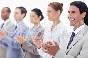 Close-up of a business team applauding