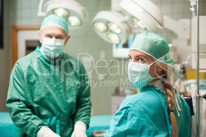 Two surgeon wearing surgical equipment