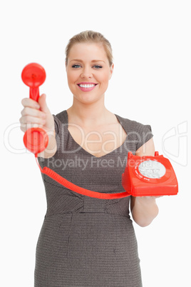 Woman showing a phone