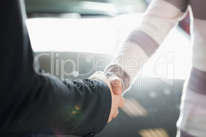 Two people shaking hand