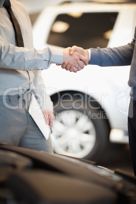 Two men shaking hand