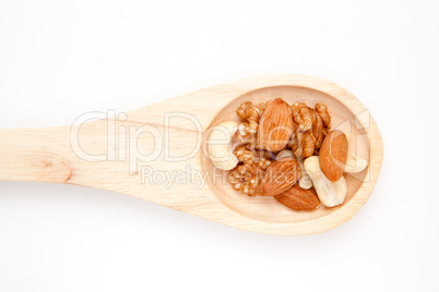 Wooden spoon with nuts