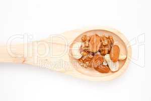 Wooden spoon with nuts