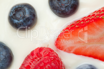 Slice berries on the cream