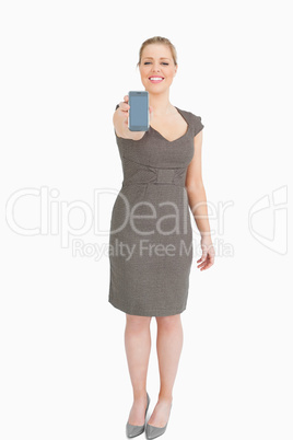 Businesswoman showing a phone