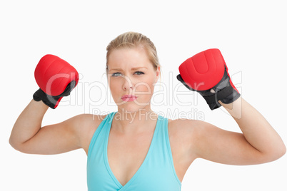 Woman showing boxing gloves