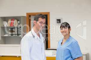 Doctor and a nurse smiling
