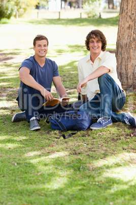 Portrait of two male students studying
