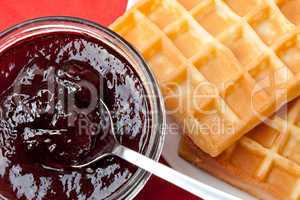 Breakfast with waffles and jam