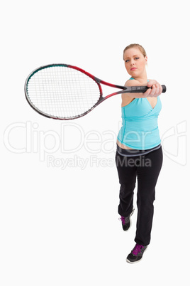 Woman showing a racquet