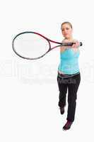 Woman showing a racquet