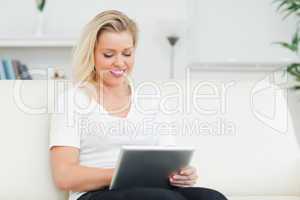 Casual woman using a tablet pc