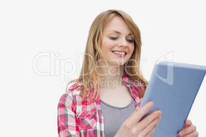 Woman looking at a tablet computer