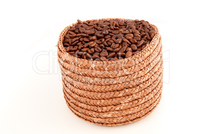 A basket full of roasted coffee seeds