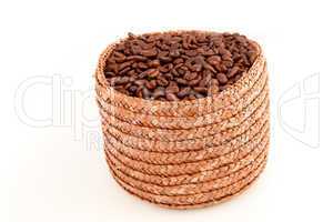 A basket full of roasted coffee seeds