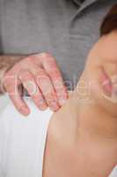 Close-up of a man massaging the nape of a woman