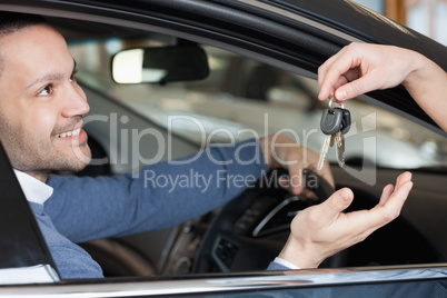 Man receiving keys