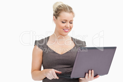 Woman browsing on a laptop