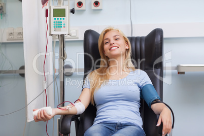 Smiling patient being transfused