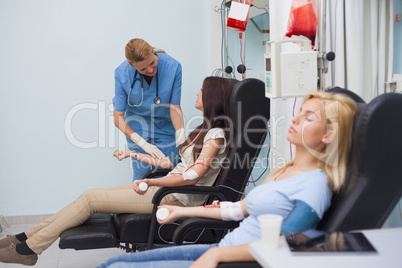 Nurse looking after a blood donor