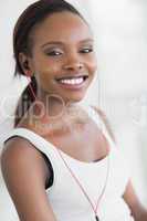 Close up of a black woman listening music