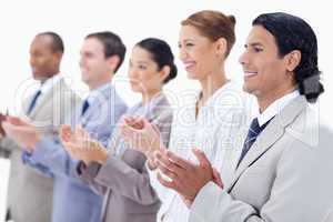 Close-up of  happy business people applauding