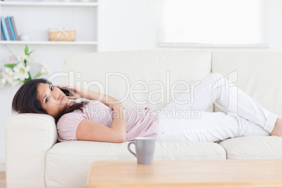 Woman resting on a couch