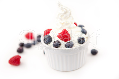 Dessert of berries and whipped cream