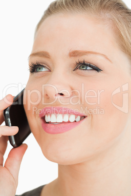 Close up of a pretty woman calling