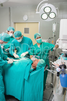 Nurse adjusting a monitor