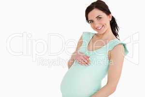 Pregnant woman smiling